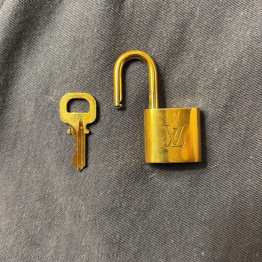 Louis Vuitton Gold Lock and Key